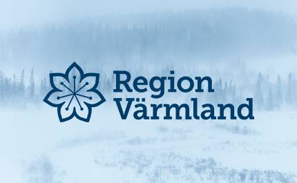 Region Värmlands logotyp mot vinterskog